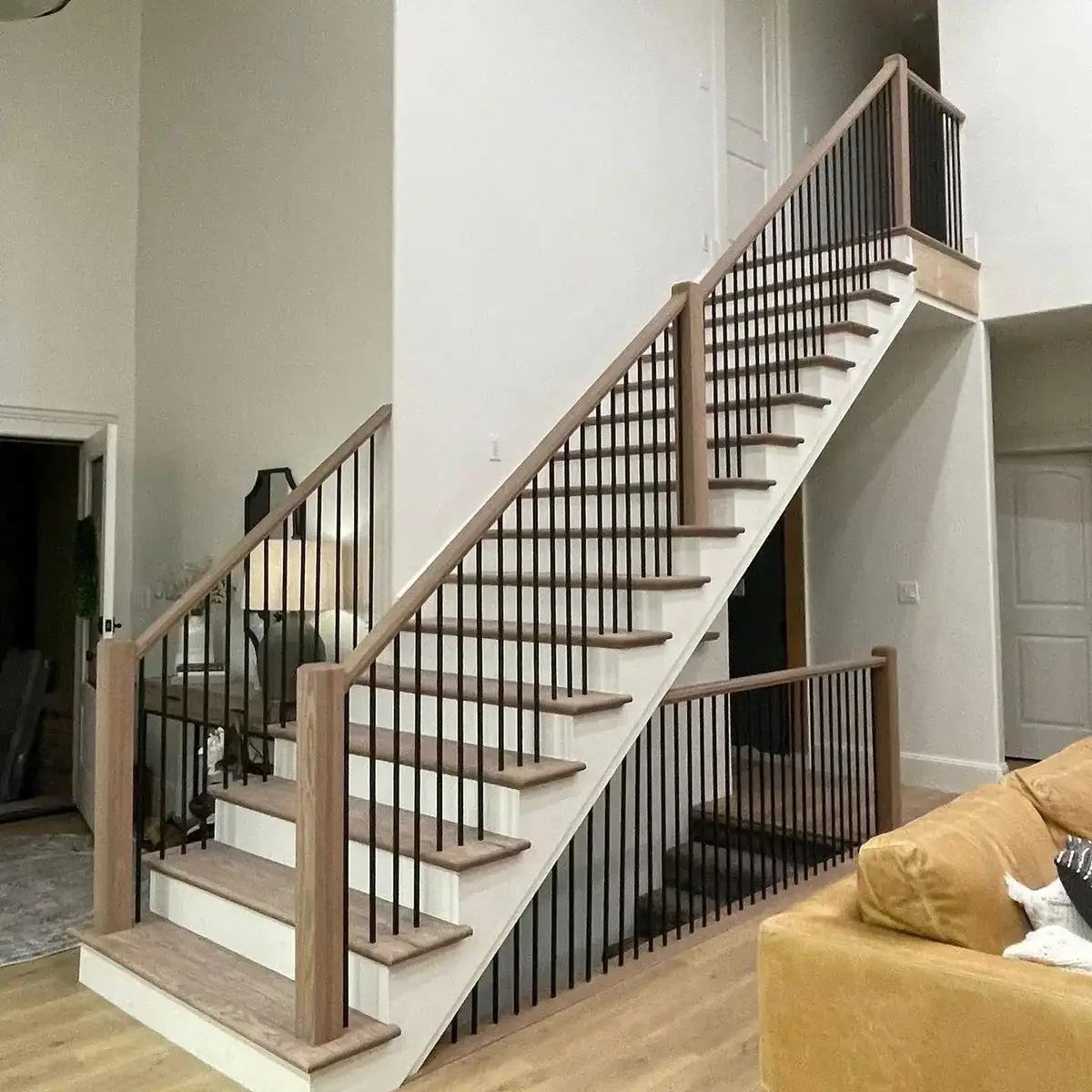 Contemporary railing installation with clean lines in an open-concept living space